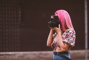 Woman Using Camera