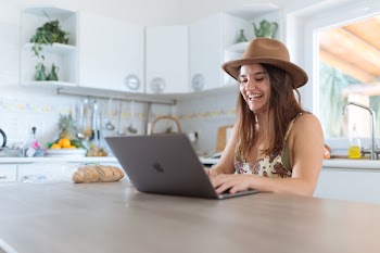 Woman Using Gray Apple Macbook