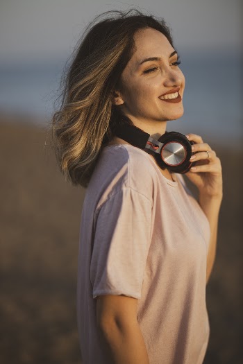 Woman Using Headphones