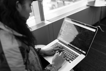 Woman Using Laptop