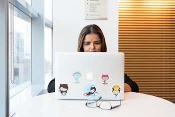 Woman Using Macbook