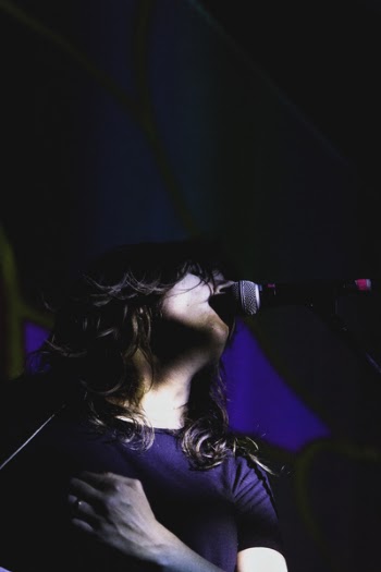 Woman Using Microphone