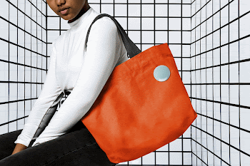 Woman using orange tote bag | Free Photo - rawpixel