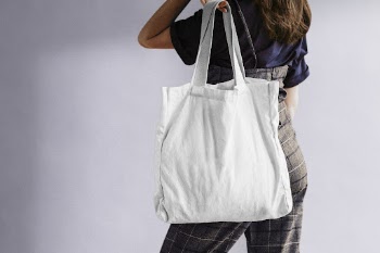 Woman using reusable tote bag, | Free Photo - rawpixel