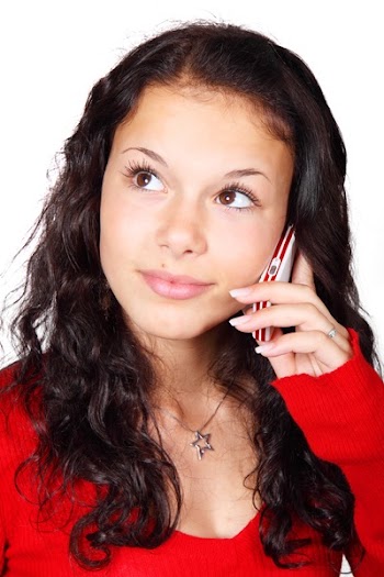 Woman Using Smartphone Wearing Red Long-sleeved Shirt