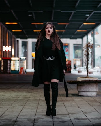 Woman Walking Alone on Pathway
