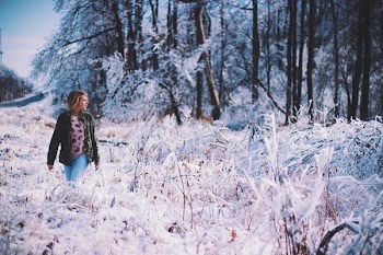 woman walking around forest