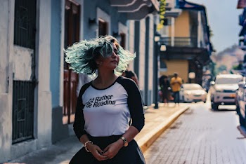 Woman Walking At The Street