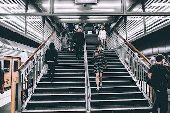 woman walking down stairs