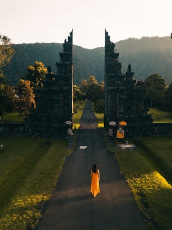 Woman Walking in Road