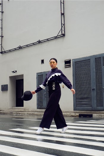 Woman Walking On Pedestrian Lane
