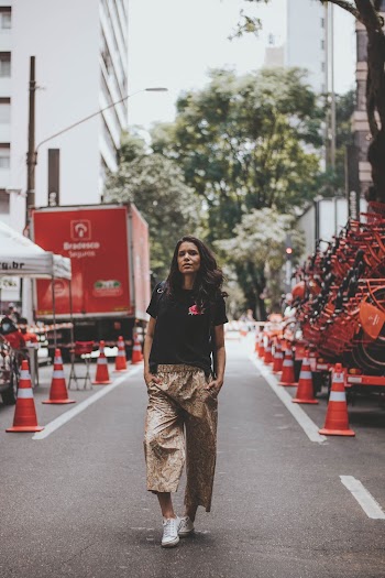 Woman Walking on Road
