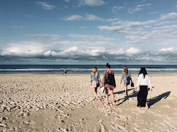Woman Walking on Seashore