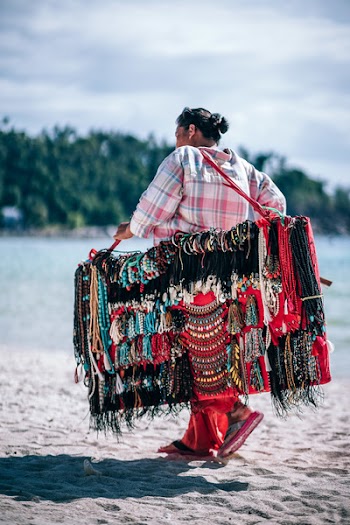 Woman Walking on Seashore