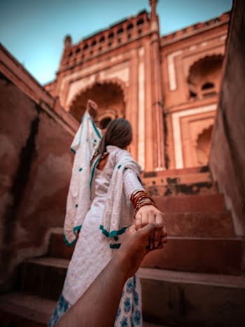 Woman Walking on Stair