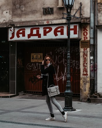 Woman Walking On Street 