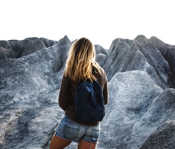 woman walking on terrain
