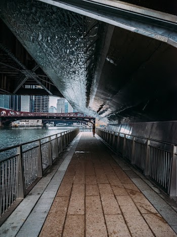 Woman Walking on the Ocean Dock