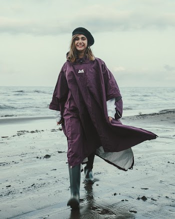 Woman Walking on the Shoreline