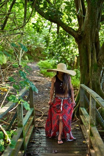 Woman Walking On Wooden Bridge