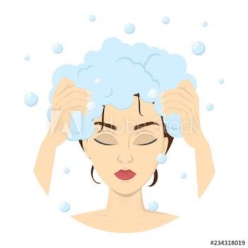 Woman washing her hair with shampoo in shower