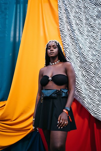Woman Wearing A Black Bra and Black Skirt