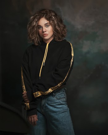 Woman Wearing A Black Hoodie