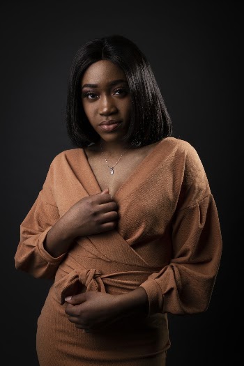 Woman Wearing A Brown Dress