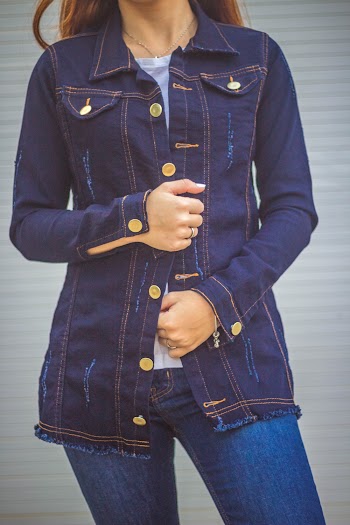 Woman wearing a denim jacket