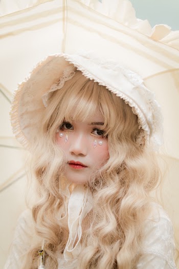 Woman Wearing A Hat 