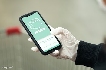 Woman wearing a latex glove while using cellphone to prevent coronavir.. | Free  psd mockup - 2298033