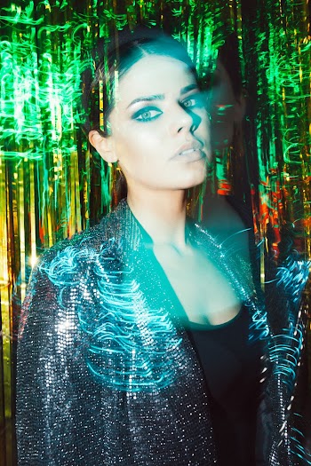 Woman Wearing A Shiny Blazer