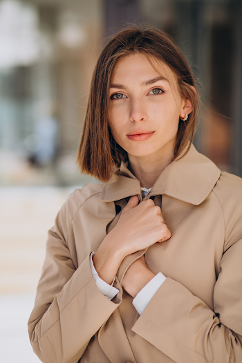 Woman wearing a trench-coat