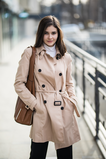 Woman wearing a trench-coat