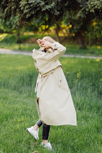 Woman wearing a trench-coat