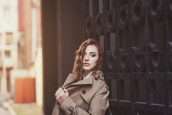 Woman wearing a trench-coat