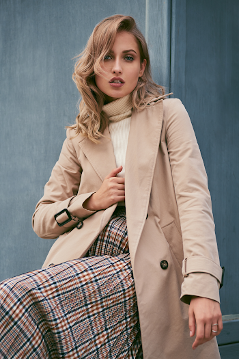 Woman wearing a trench-coat