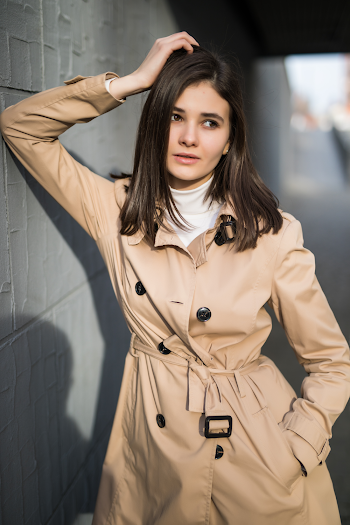 Woman wearing a trench-coat