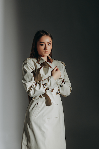 Woman wearing a trench-coat