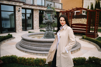 Woman wearing a trench-coat
