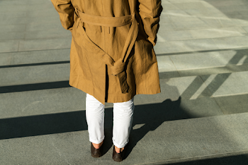Woman wearing a trench-coat