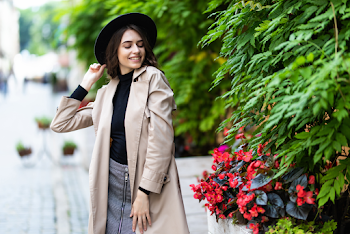 Woman wearing a trench-coat