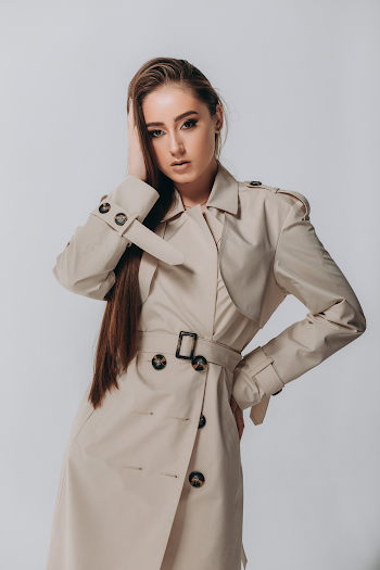 Woman wearing a trench-coat