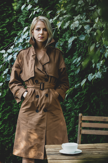 Woman wearing a trench-coat