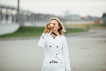 Woman wearing a trench-coat
