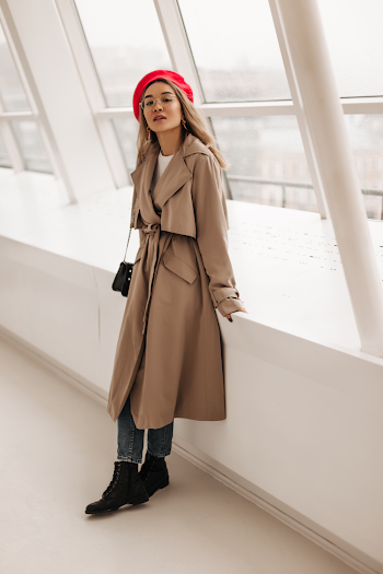 Woman wearing a trench-coat