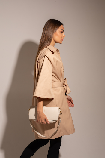 Woman wearing a trench-coat