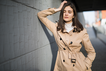 Woman wearing a trench-coat
