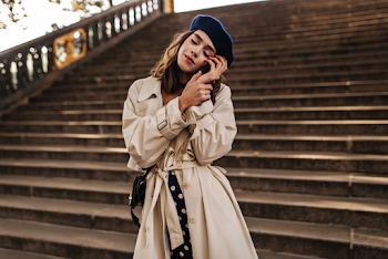 Woman wearing a trench-coat