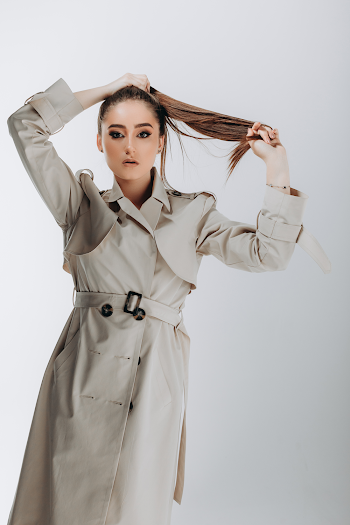 Woman wearing a trench-coat